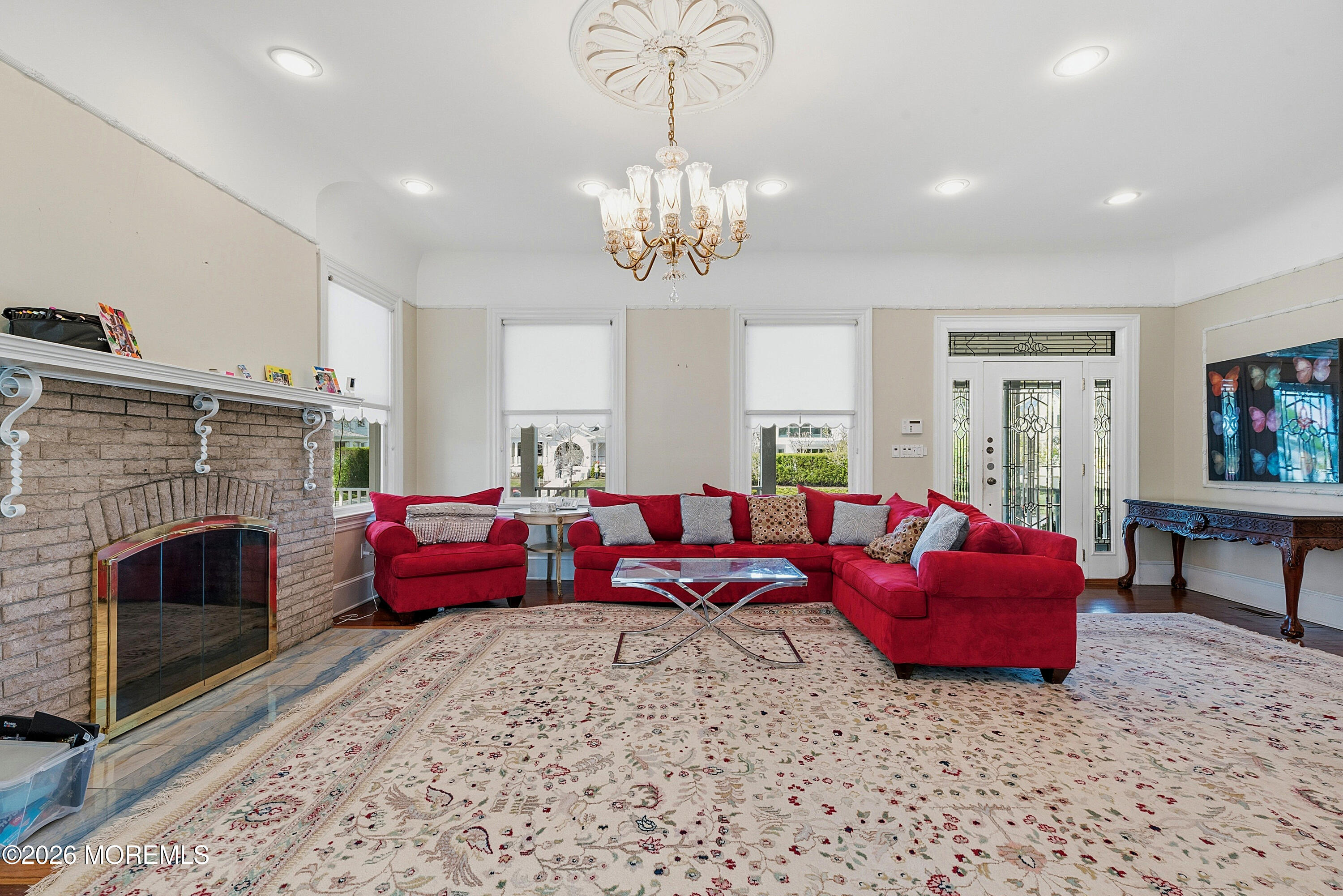 48 Neptune Avenue Deal, NJ 07723 - Photo 2 of 32 a living room with furniture fireplace and window