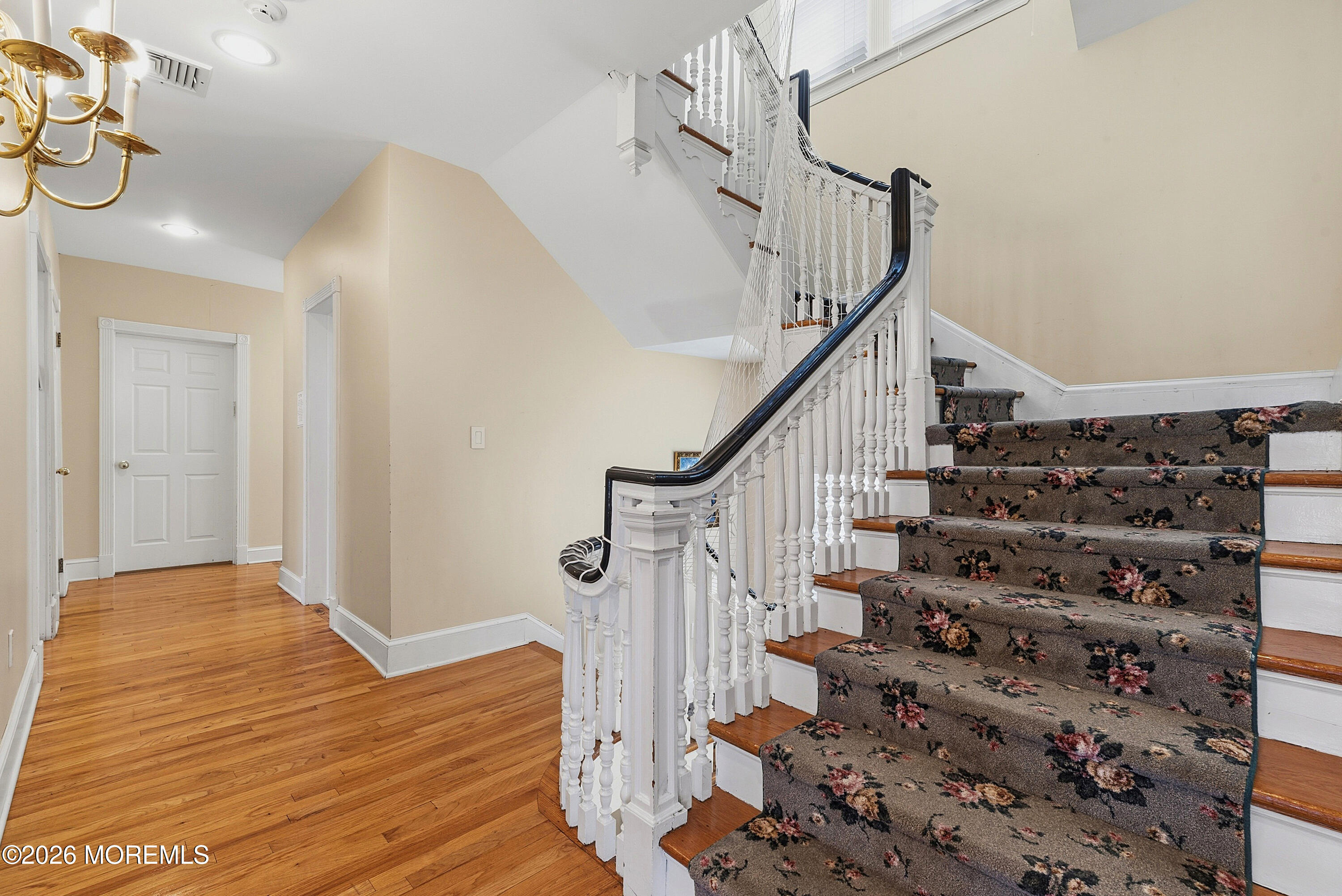 48 Neptune Avenue Deal, NJ 07723 - Photo 24 of 32 a view of entryway with wooden floor