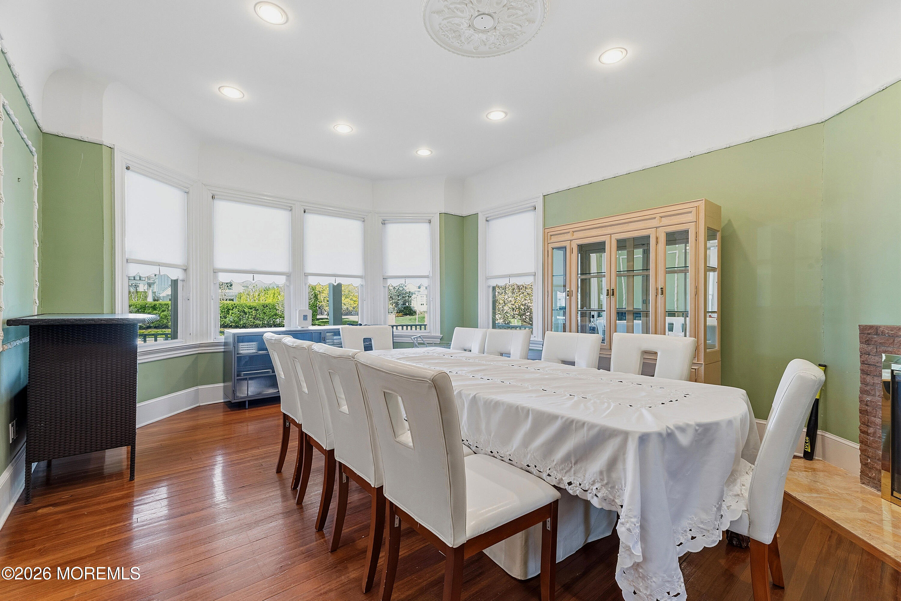 48 Neptune Avenue Deal, NJ 07723 - Photo 4 of 32 a view of a dining room with furniture window and wooden floor