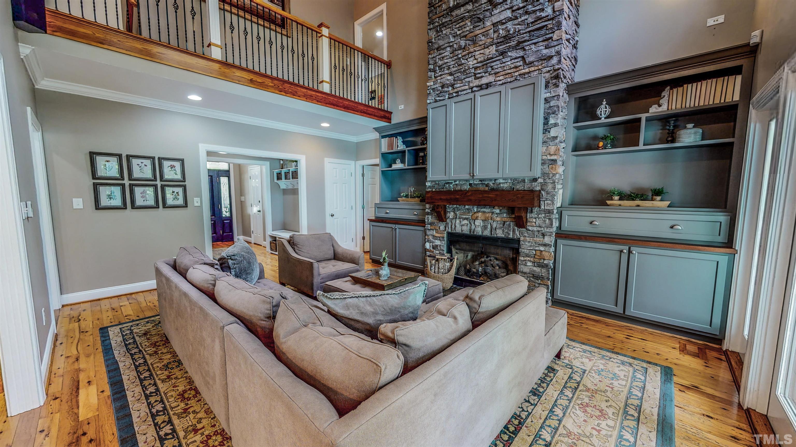 303 Bowen Road Rougemont, NC 27572 - Photo 12 of 85 a living room with furniture and a fireplace