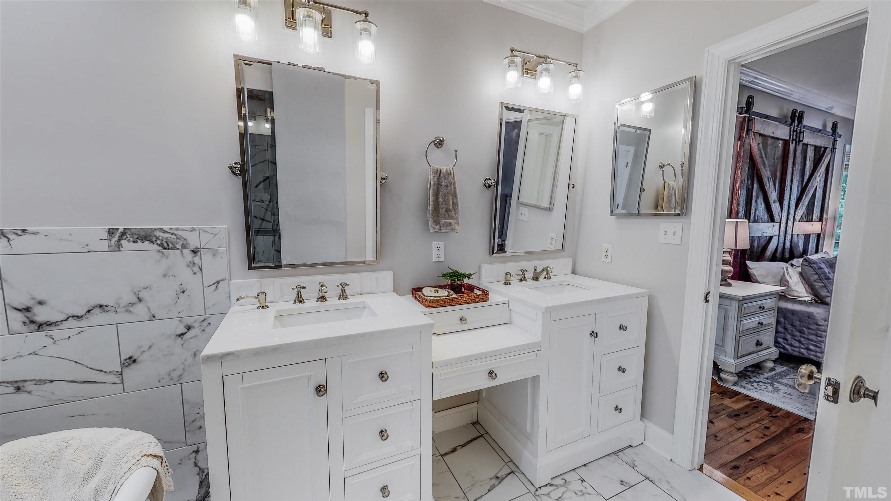 303 Bowen Road Rougemont, NC 27572 - Photo 14 of 85 a bathroom with a double vanity sink mirror and shower