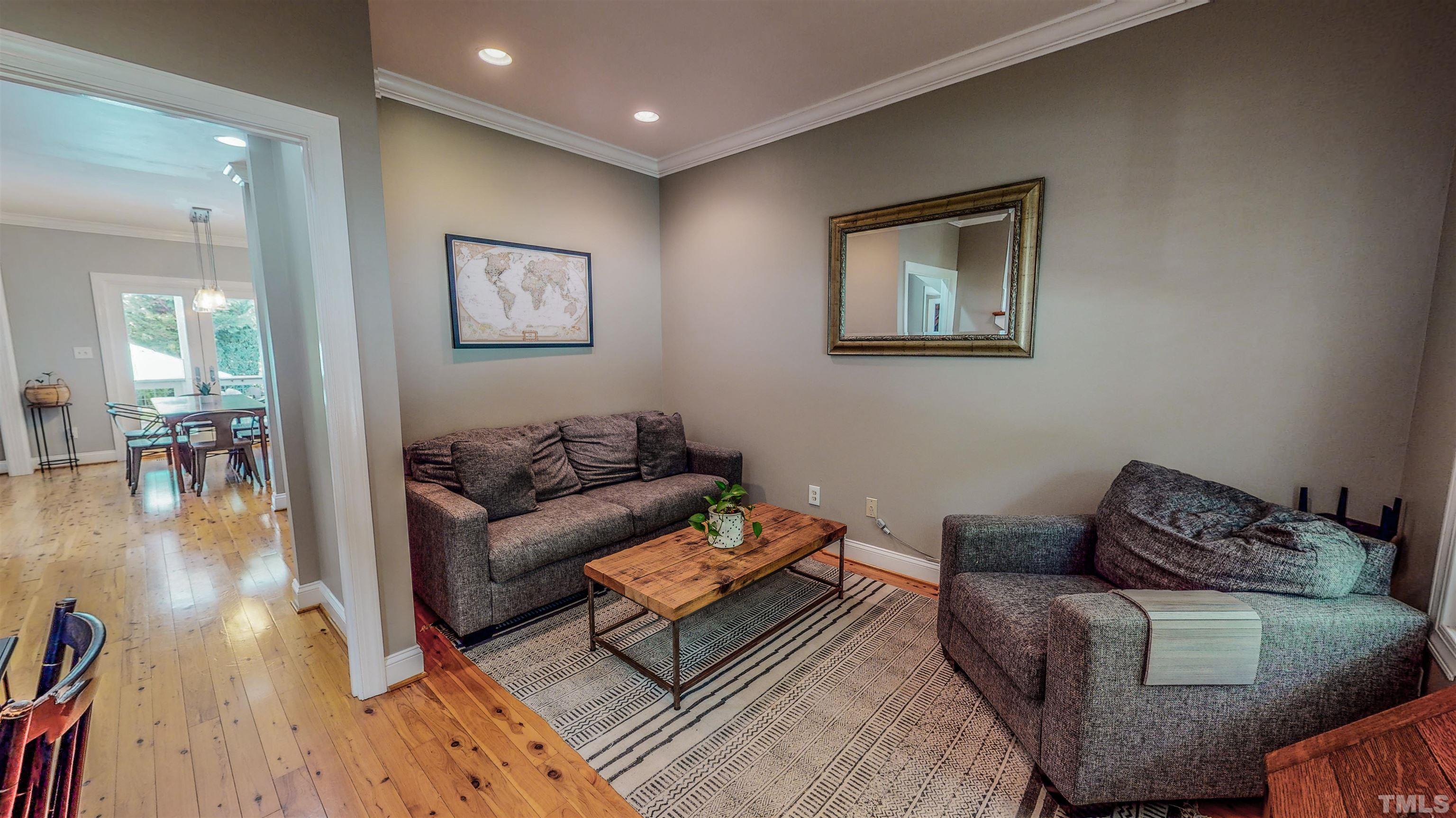 303 Bowen Road Rougemont, NC 27572 - Photo 36 of 85 a living room with furniture and a wooden floor