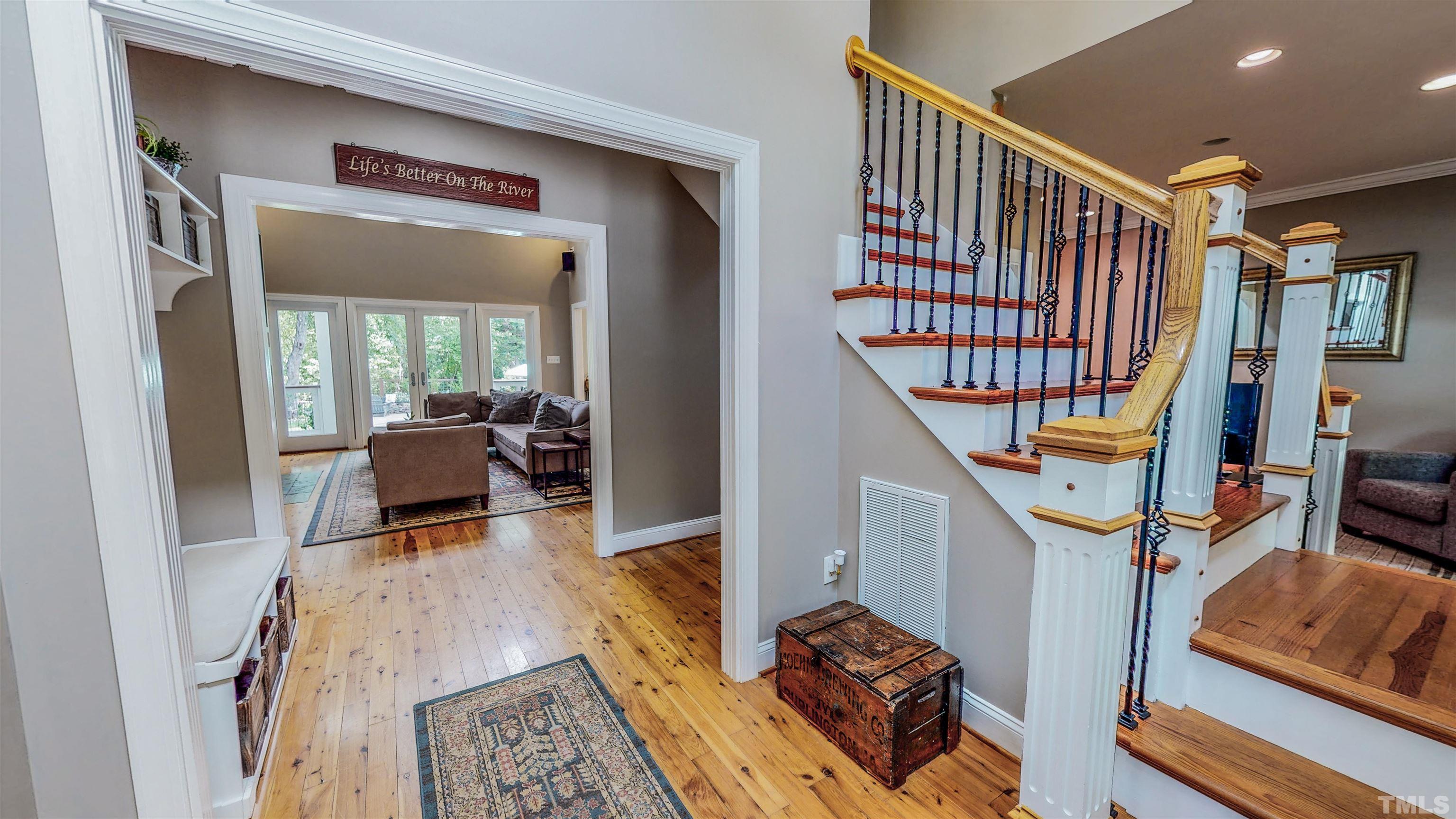 303 Bowen Road Rougemont, NC 27572 - Photo 37 of 85 a living room with furniture and a rug