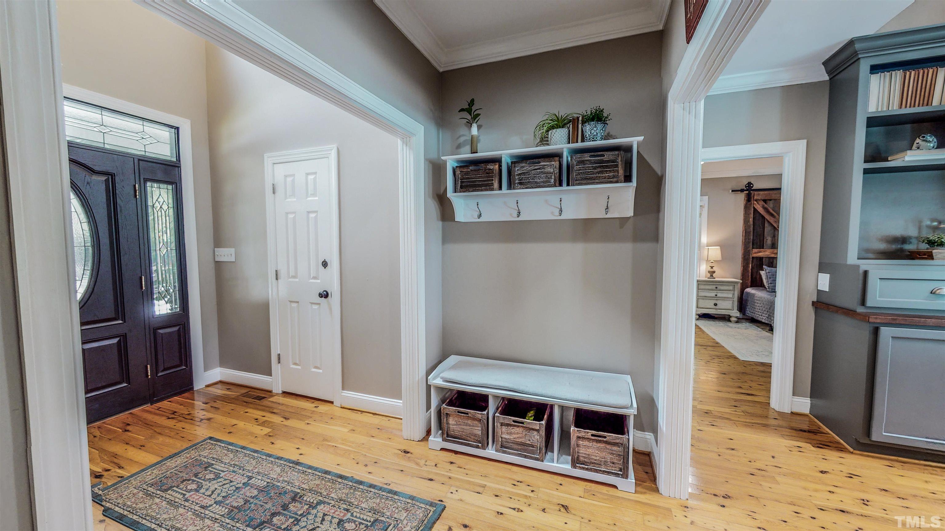 303 Bowen Road Rougemont, NC 27572 - Photo 38 of 85 a living room with stainless steel appliances kitchen island granite countertop a refrigerator and a fireplace