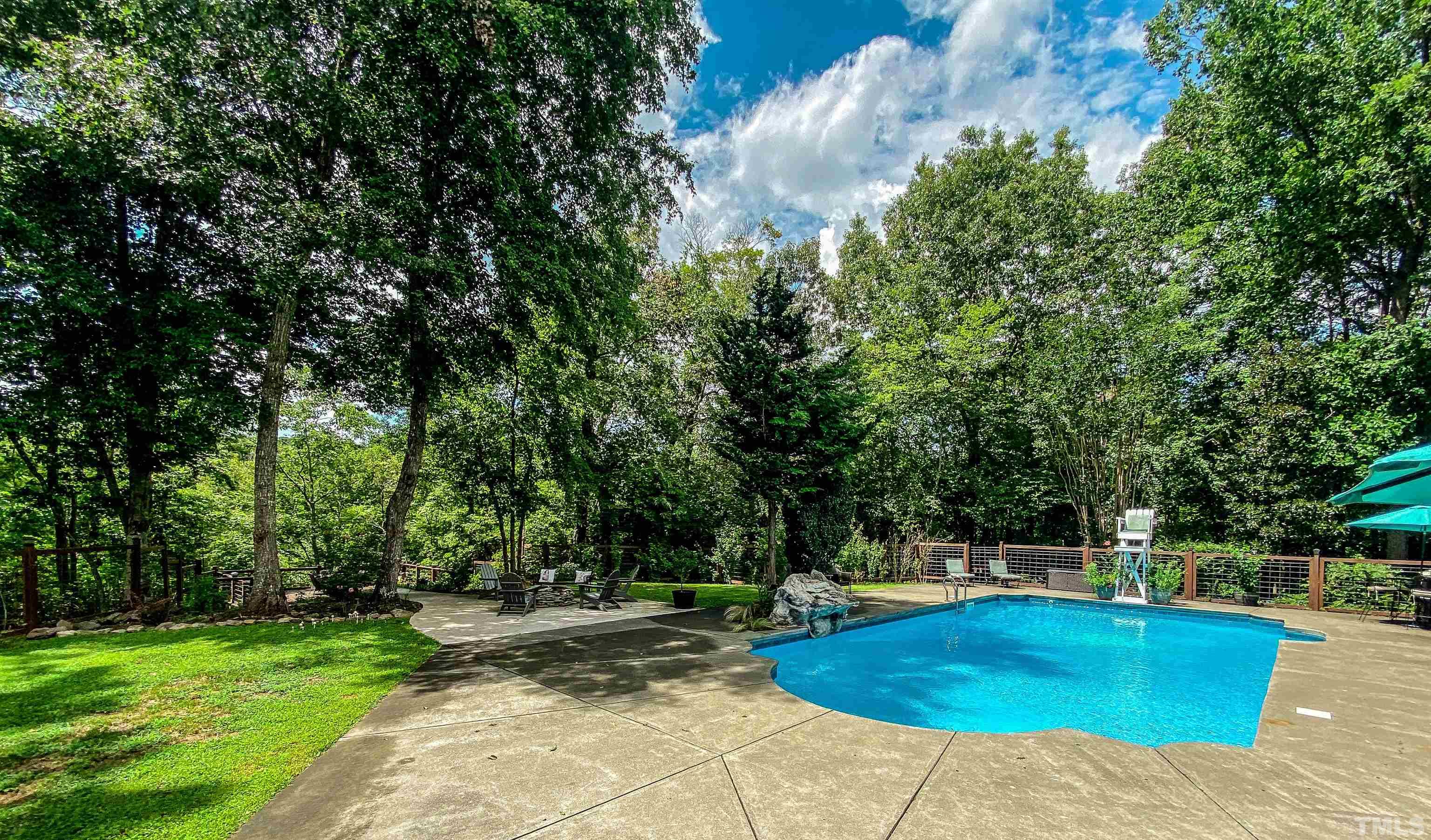 303 Bowen Road Rougemont, NC 27572 - Photo 63 of 85 a view of a swimming pool with a patio