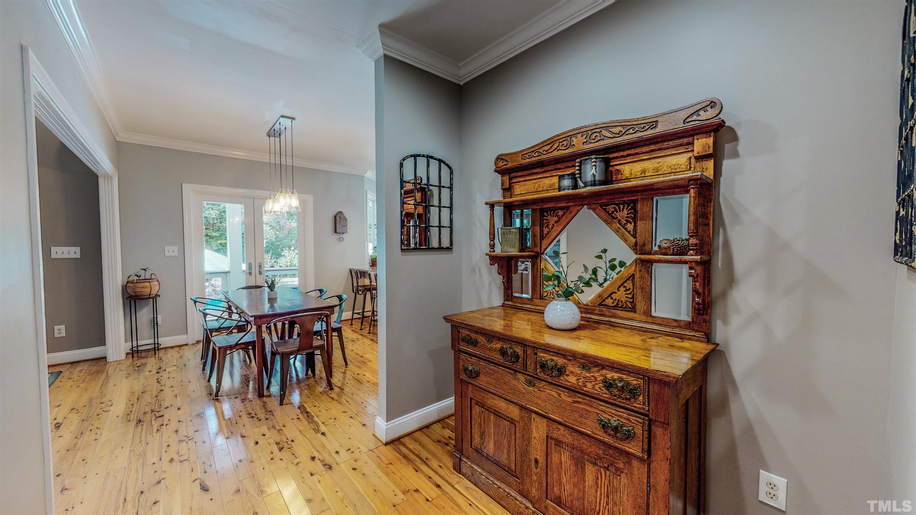303 Bowen Road Rougemont, NC 27572 - Photo 73 of 85 a view of a dining room with furniture and wooden floor
