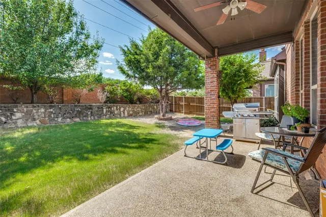 a garden view with a seating space