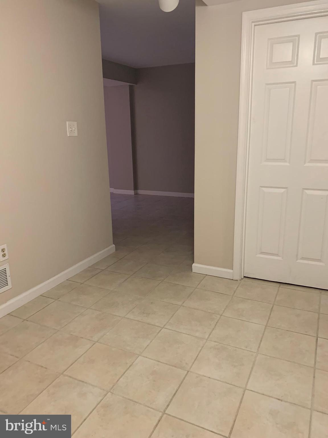 7069 Leestone Street Springfield, VA 22151 - Photo 34 of 40 Basement foyer