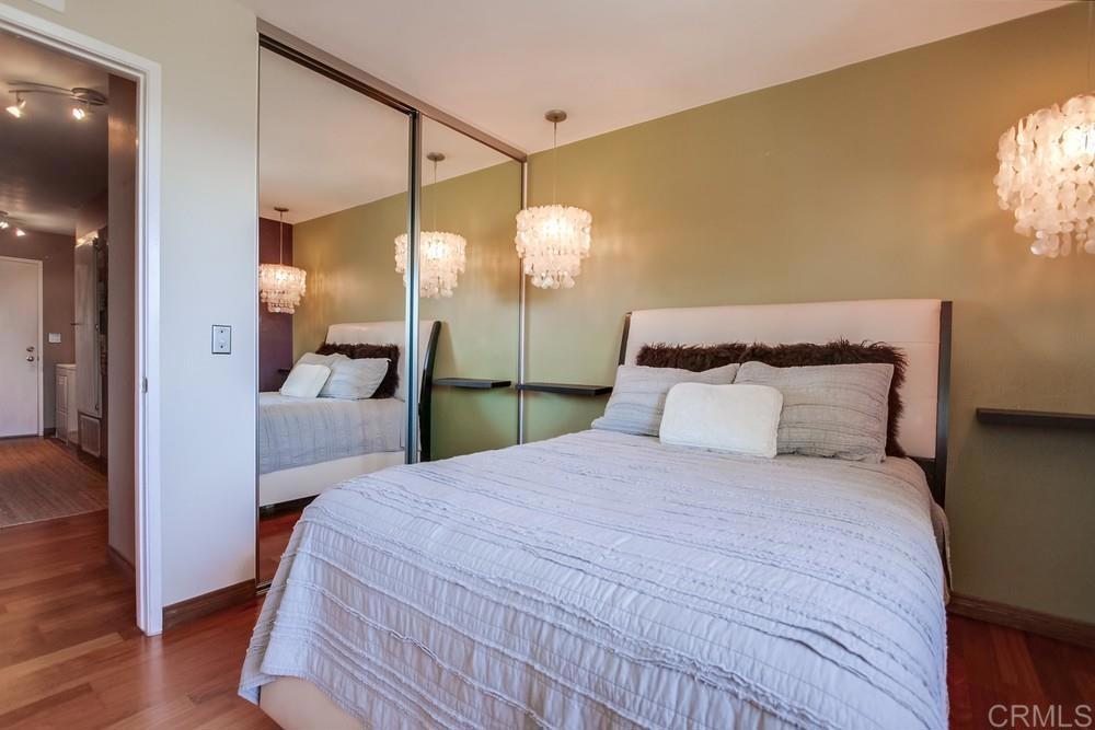 428 Compass Road Oceanside, CA 92054 - Photo 16 of 21 a bedroom with a bed and a mirror