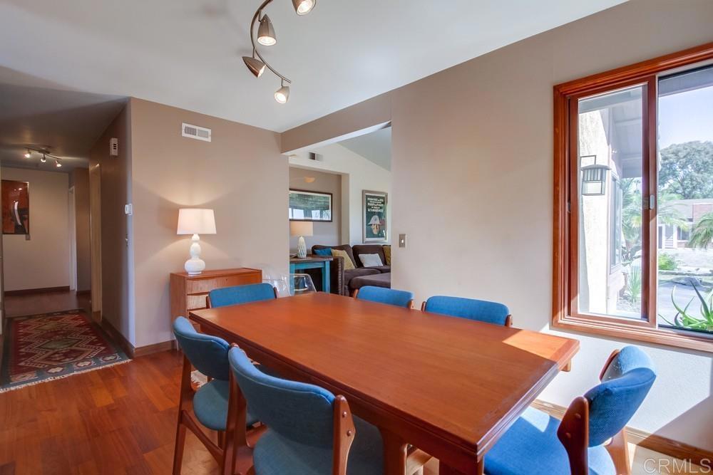 428 Compass Road Oceanside, CA 92054 - Photo 6 of 21 a view of a dining room with furniture and window