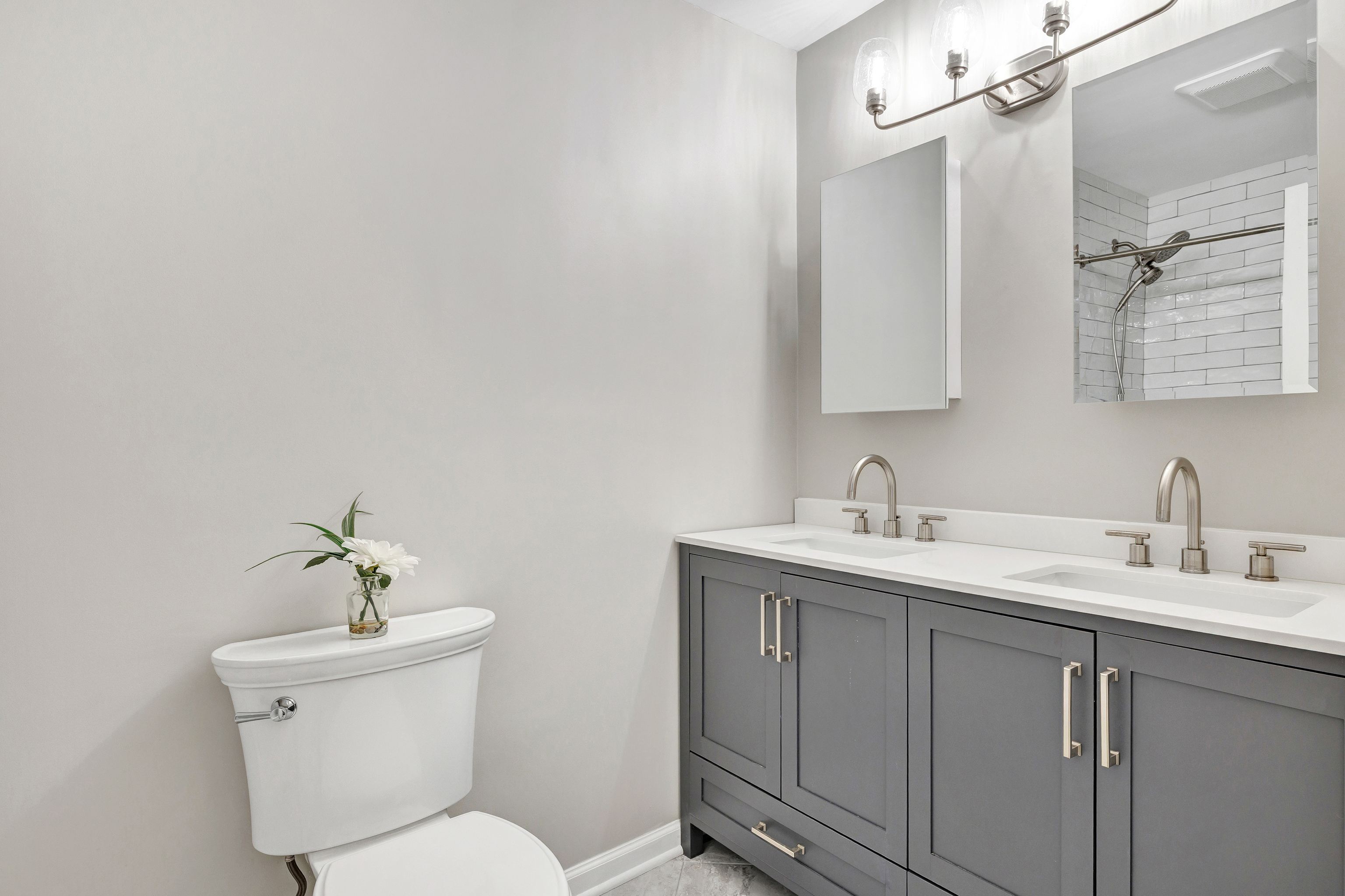 91 Harvester Road Monroe, CT 06468 - Photo 20 of 35 a bathroom with a toilet a sink and mirror