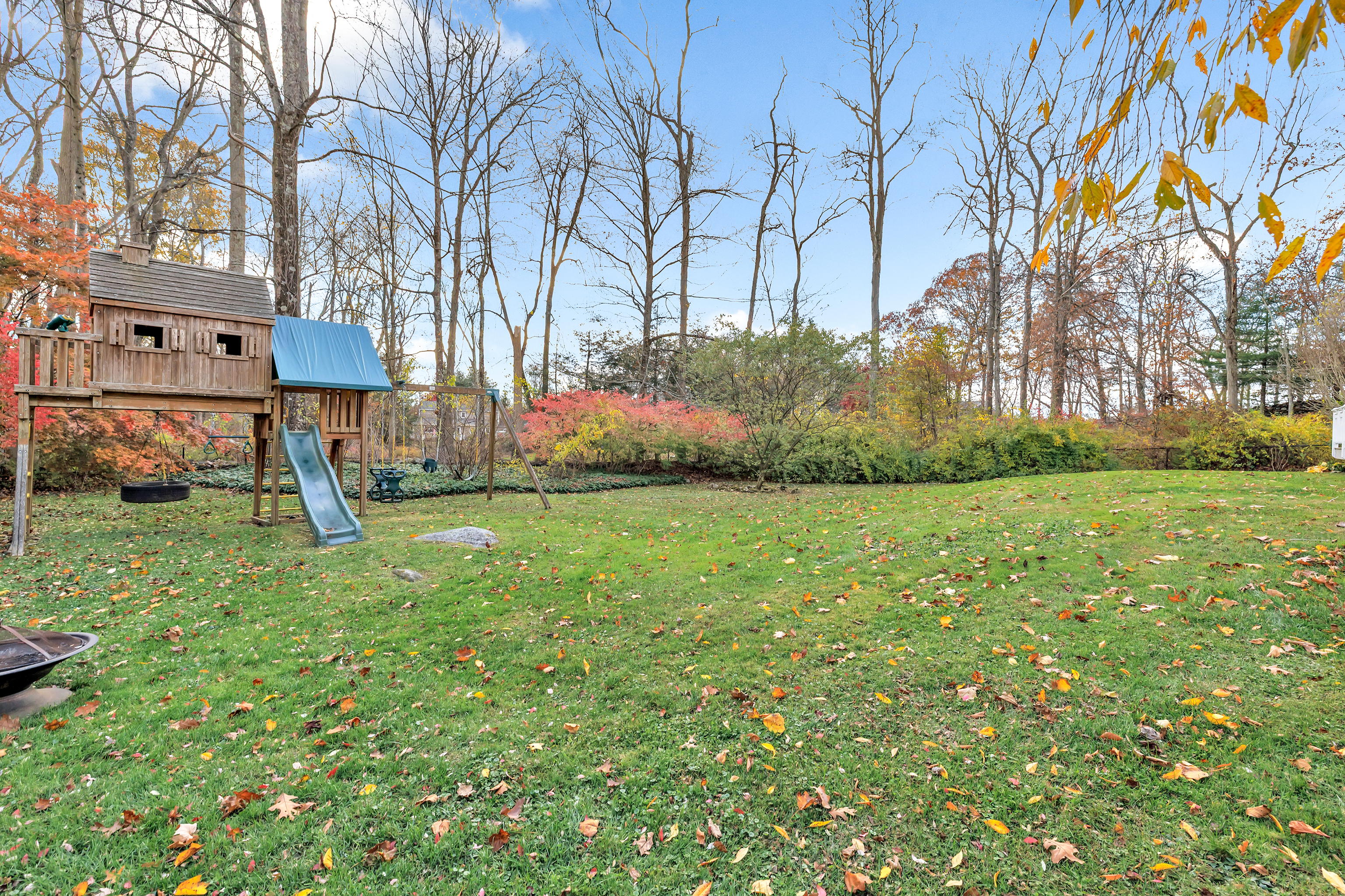 91 Harvester Road Monroe, CT 06468 - Photo 28 of 35 a view of a yard with plants and trees