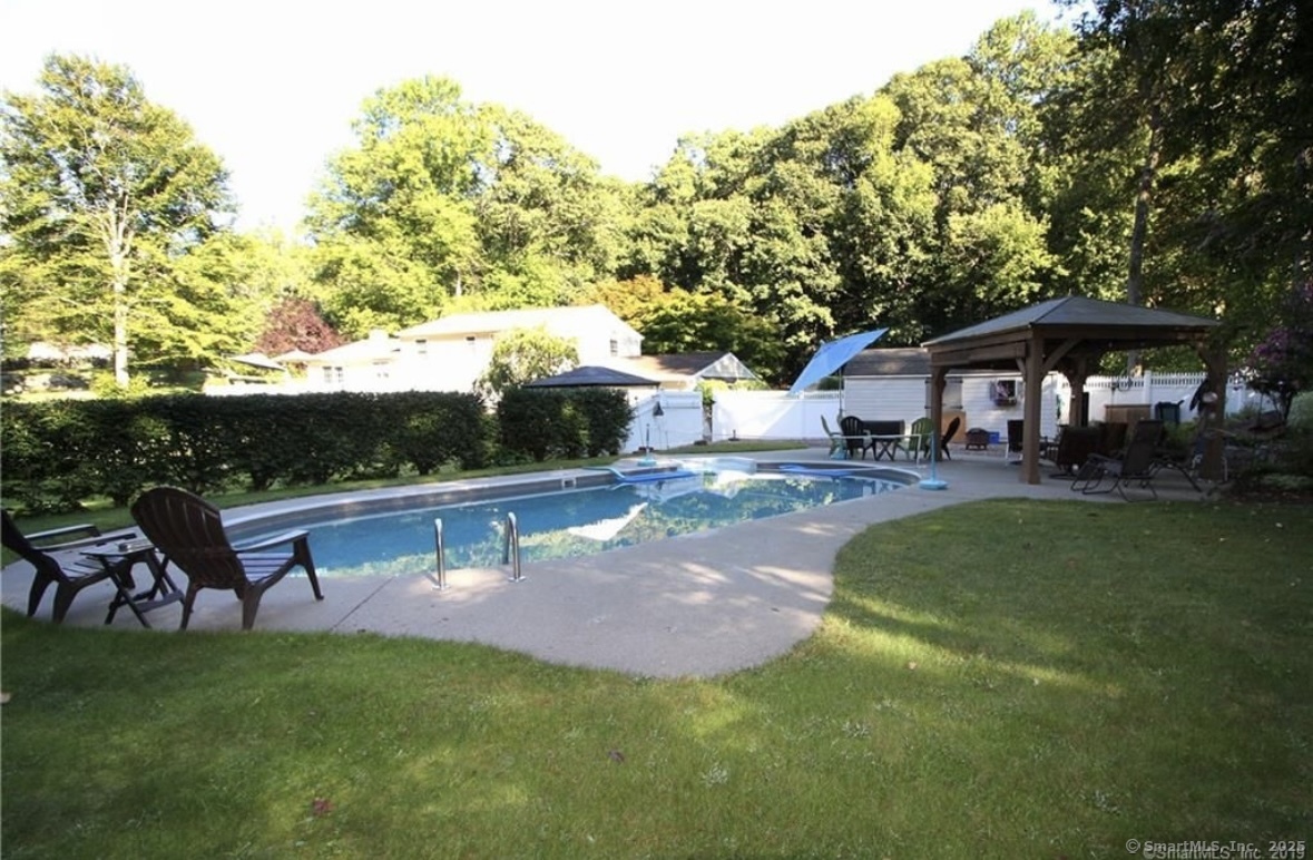 91 Harvester Road Monroe, CT 06468 - Photo 34 of 35 a view of a house with a yard