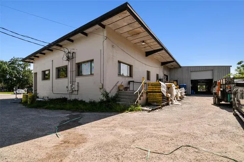a view of livingroom with furniture and floor to ceiling window