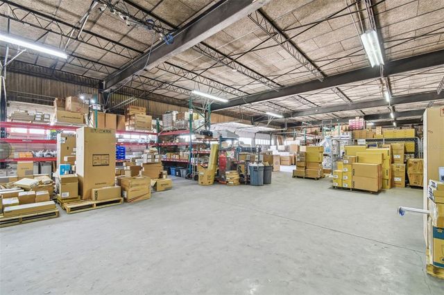 a workspace with furniture and wooden floor