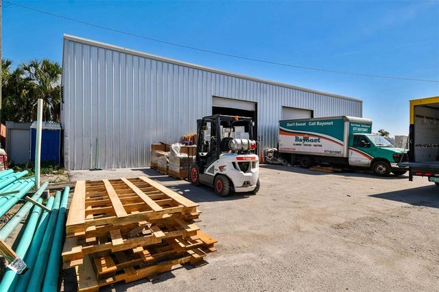 a view of a livingroom with furniture and a table