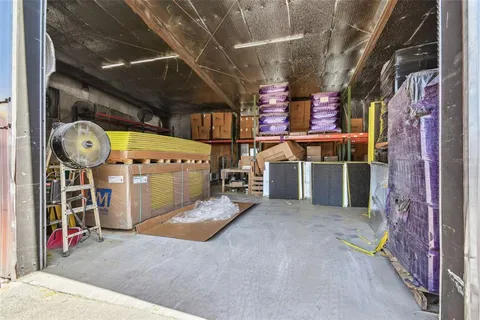 a room with furniture and wooden floor