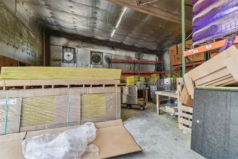 a room with furniture a flat screen tv and a fireplace