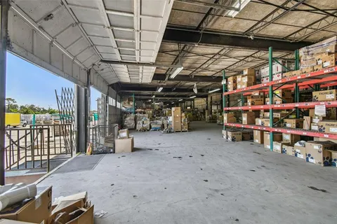 a view of a workspace with furniture