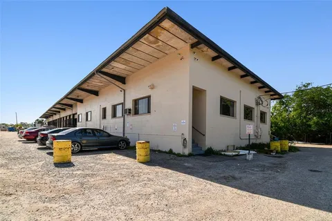 a view of a room with wooden racks