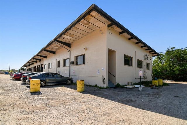 a view of a room with wooden racks