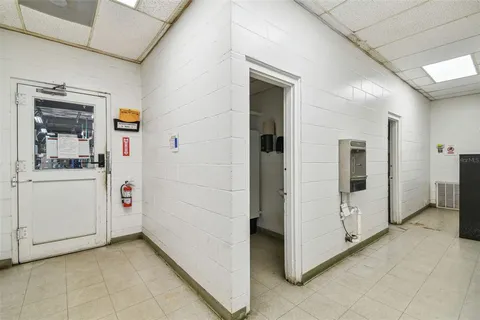 a view of a workspace with furniture