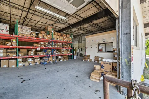 a view of a storage & utility room with washer and dryer