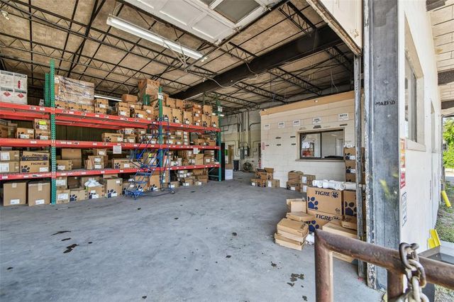 a view of a storage & utility room with washer and dryer