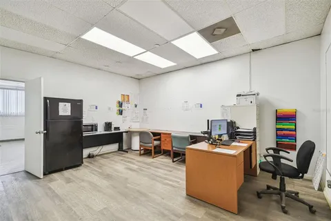 an aerial view of a house with a outdoor space