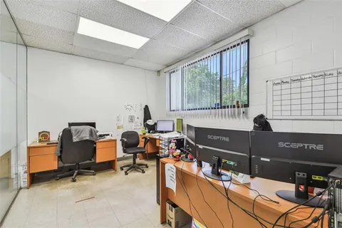 an aerial view of a house with a garden