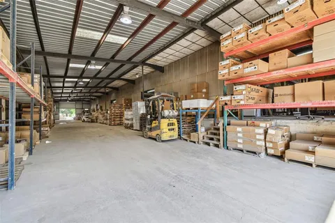 a view of a livingroom with furniture and a fireplace