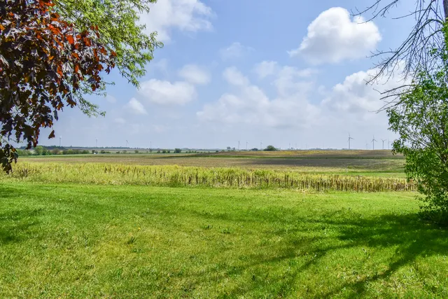 a view of a garage with a bike and wooden roof
