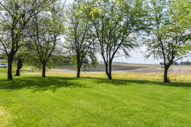 a view of a room with wooden walls