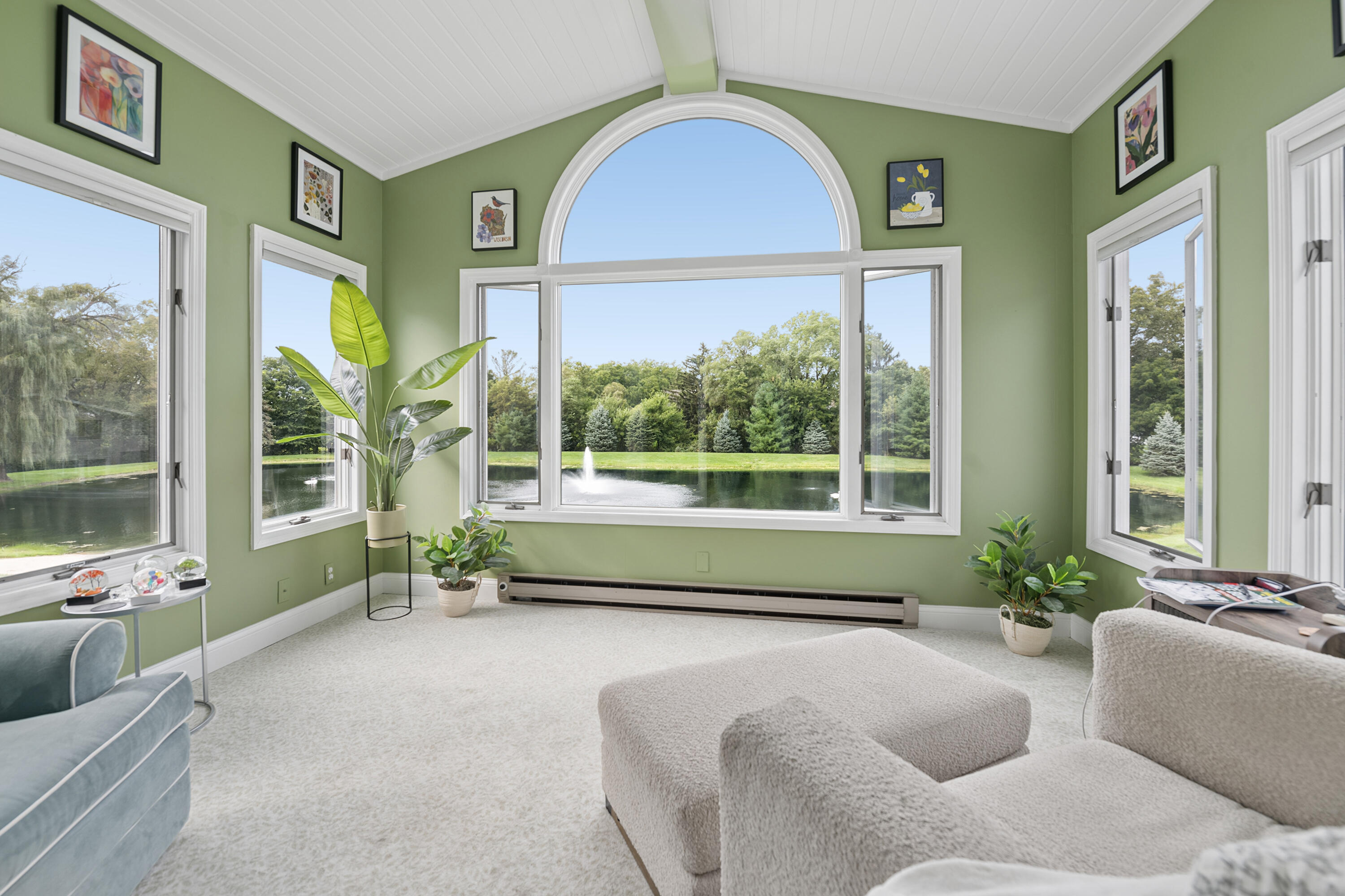 W4776 Potter Road, Unit 5 Lafayette, WI 53121 - Photo 4 of 25 Fabulous Sunroom Overlooking Pond