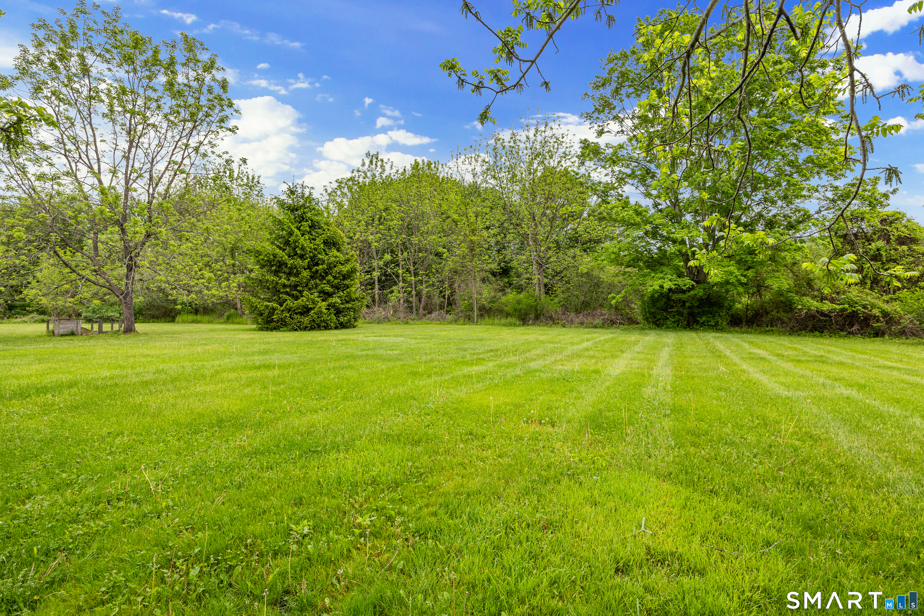 694 Millbrook Road Middletown, CT 06457 - Photo 33 of 34 a view of outdoor space with deck and yard