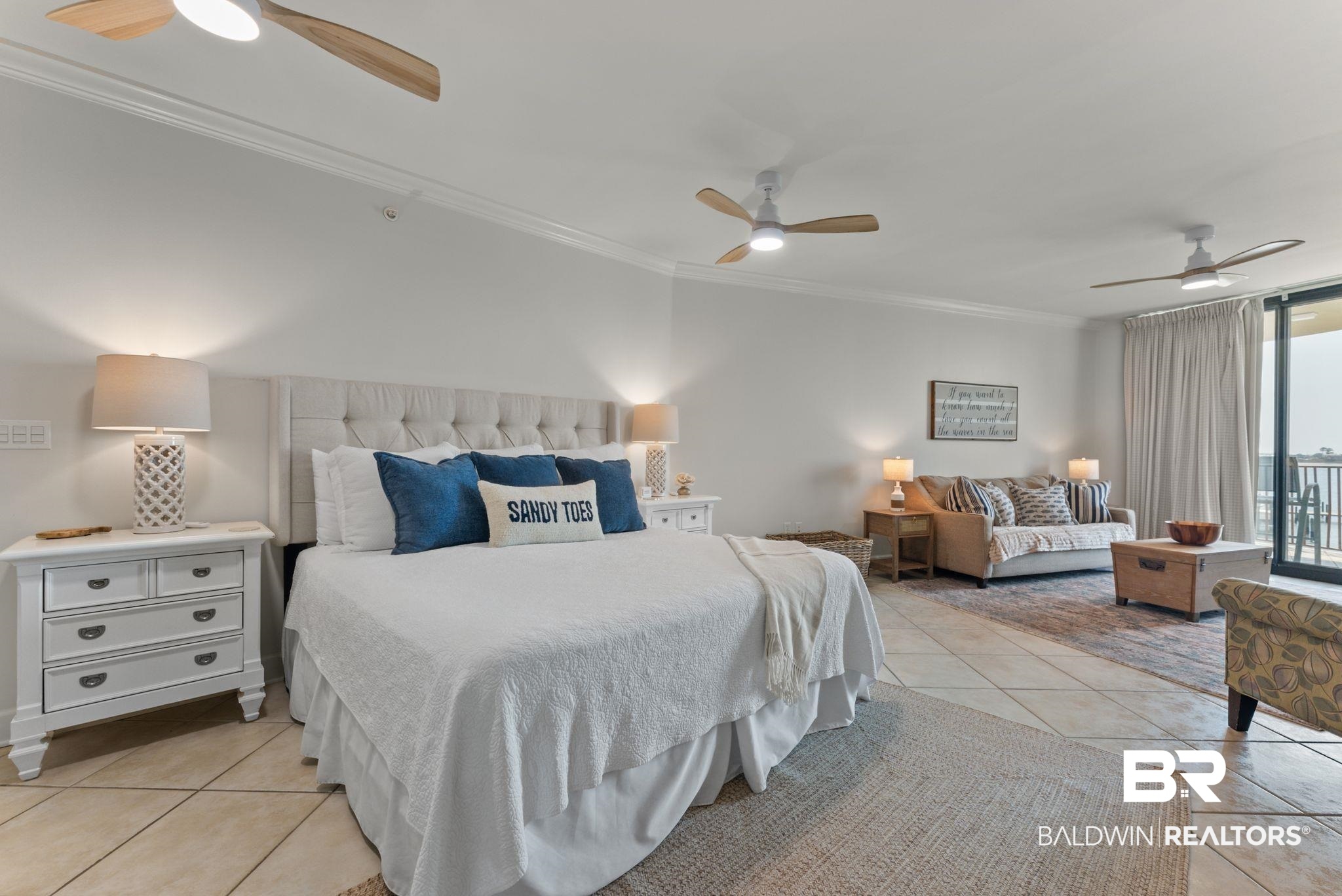 27580 Canal Road, Unit 1233 Orange Beach, AL 36561 - Photo 29 of 79 Bedroom with ornamental molding, ceiling fan, light tile patterned flooring, and access to outside