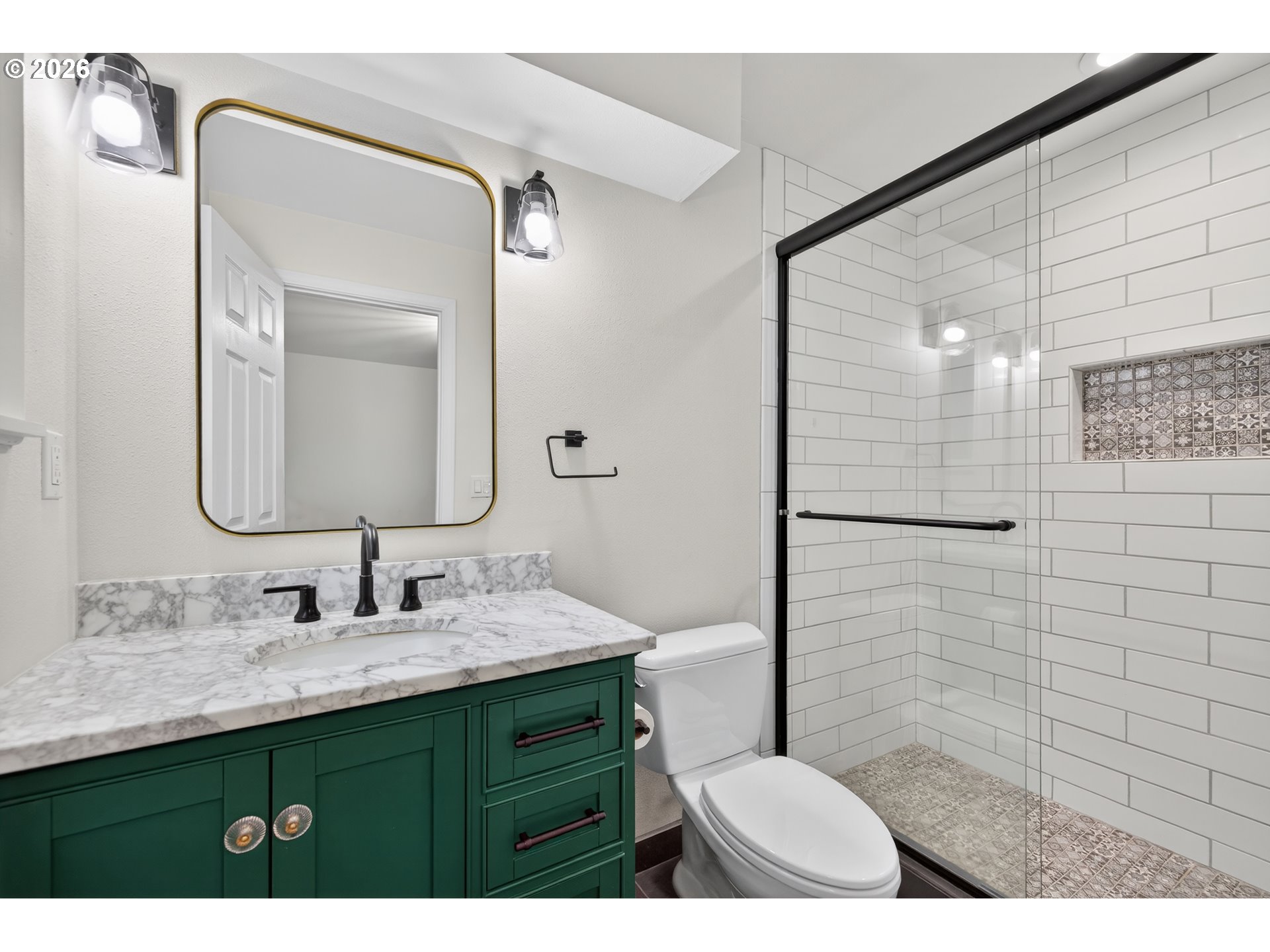 7450 Southwest 101st Avenue Beaverton, OR 97008 - Photo 30 of 37 a bathroom with a sink vanity granite toilet and shower