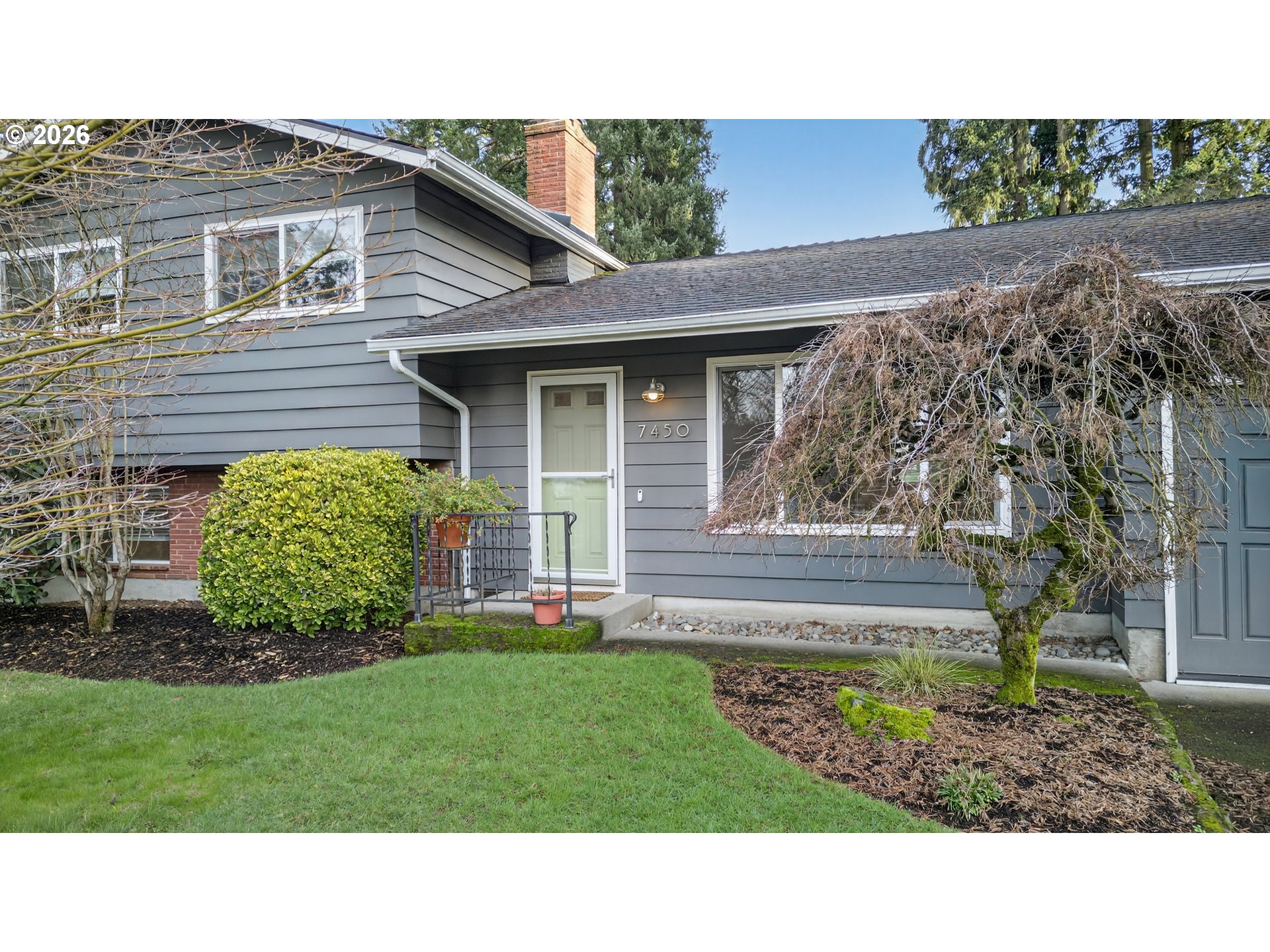 7450 Southwest 101st Avenue Beaverton, OR 97008 - Photo 3 of 37 a black and white photo of a house