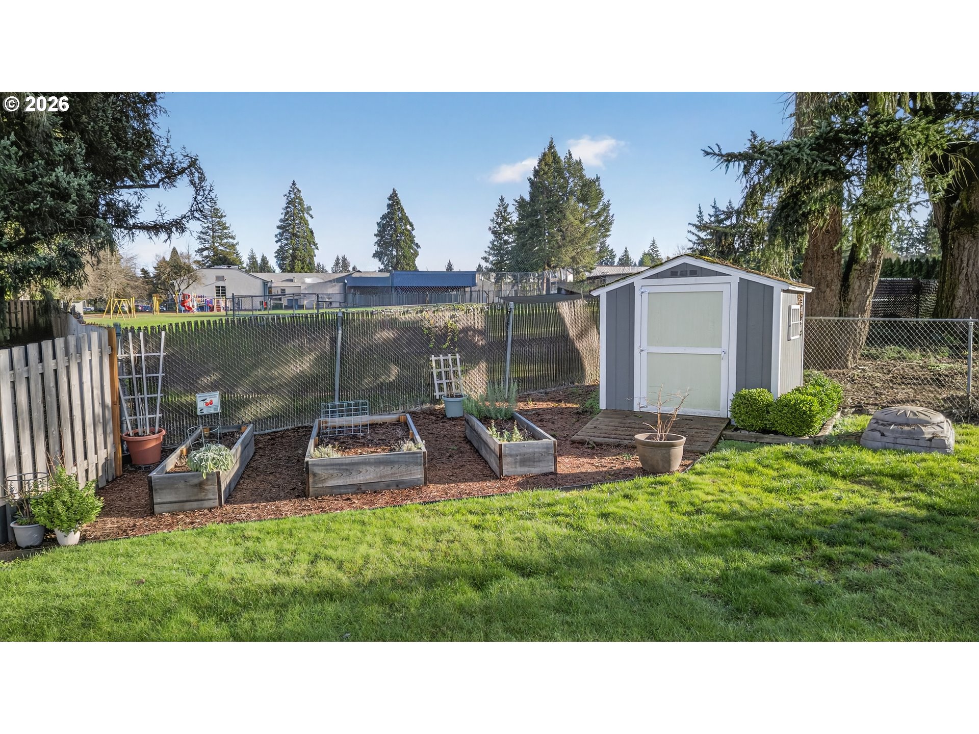 7450 Southwest 101st Avenue Beaverton, OR 97008 - Photo 35 of 37 a view of a backyard with sitting area