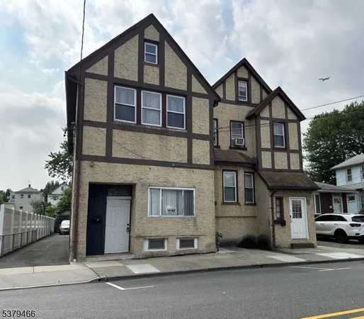 front view of a house with a street