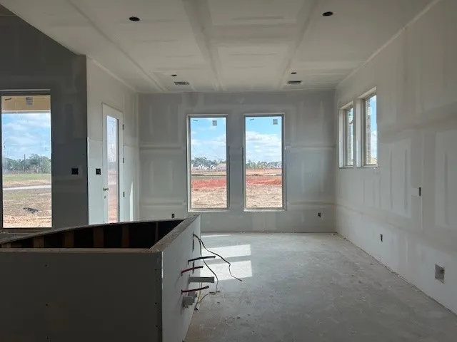 an empty room with windows