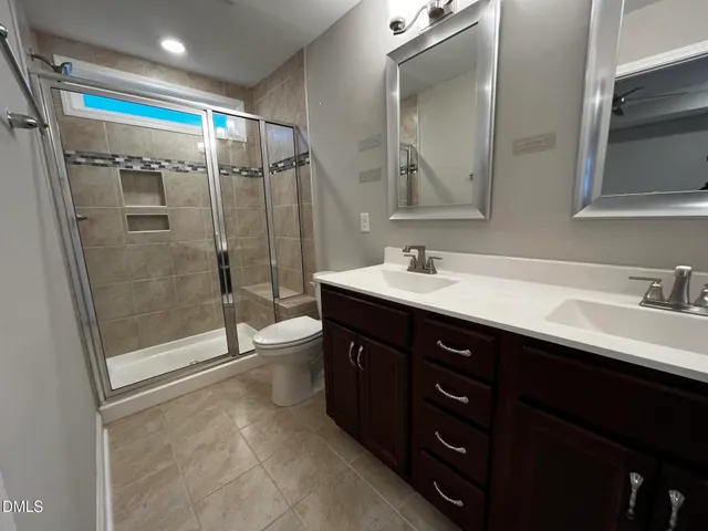 a room with a sink and cabinets