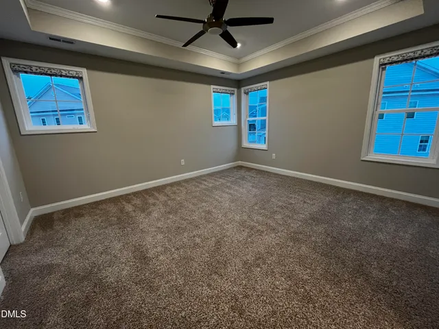 a bathroom with a sink shower and a mirror