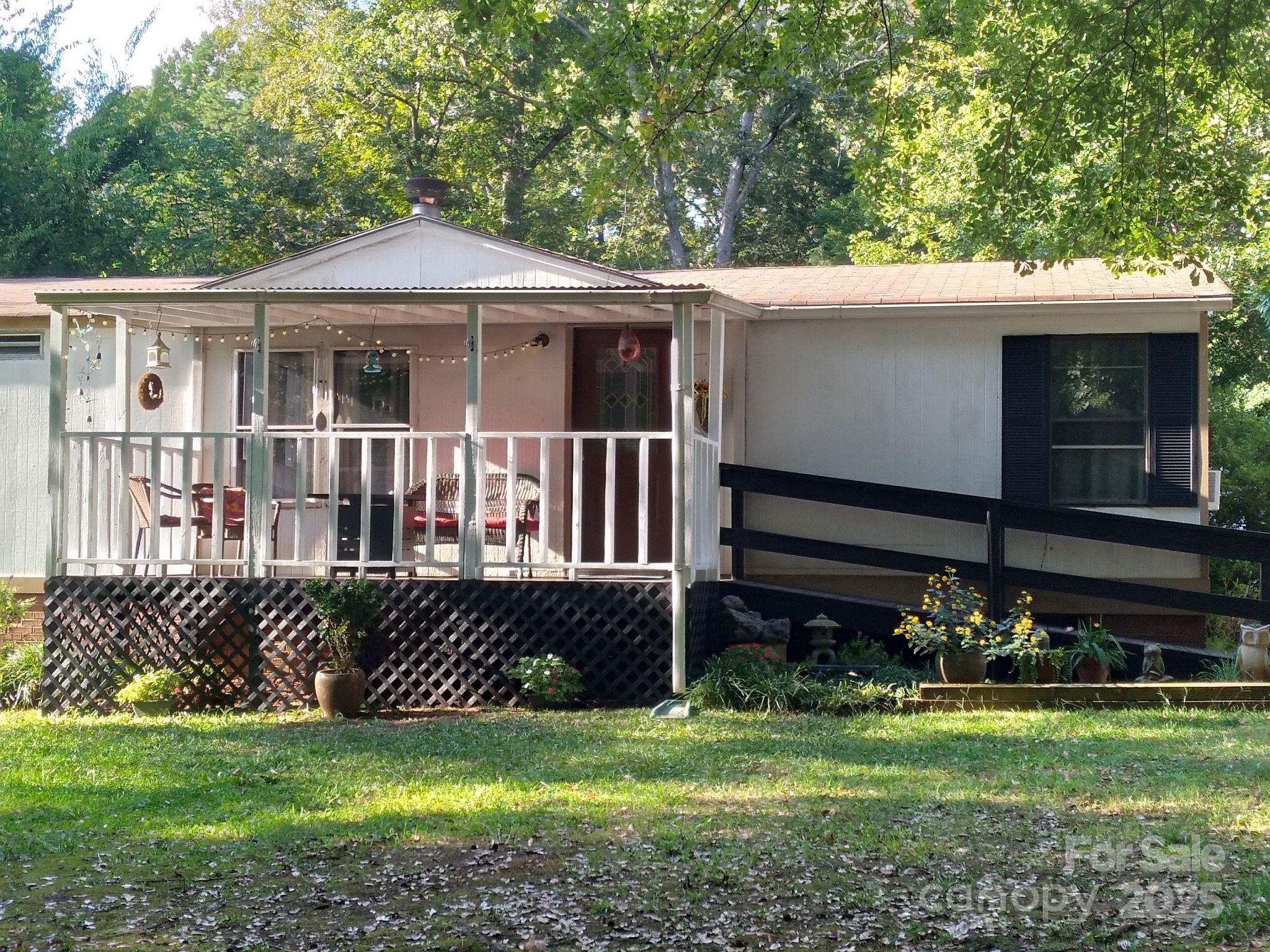 104 Little River Road Fort Mill, SC 29707 - Photo 15 of 21 a front view of a house with a yard