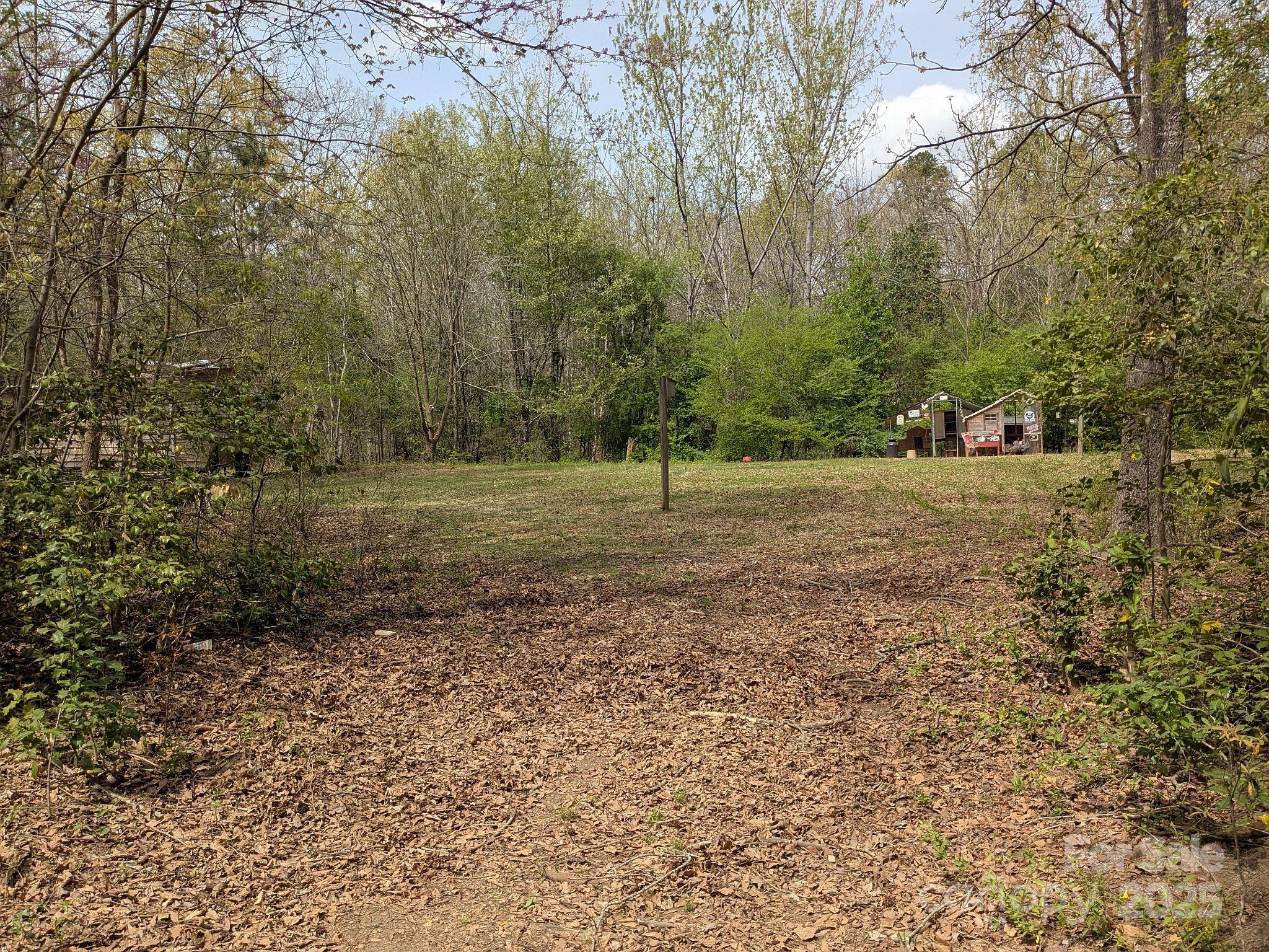 104 Little River Road Fort Mill, SC 29707 - Photo 17 of 21 a view of outdoor space with trees
