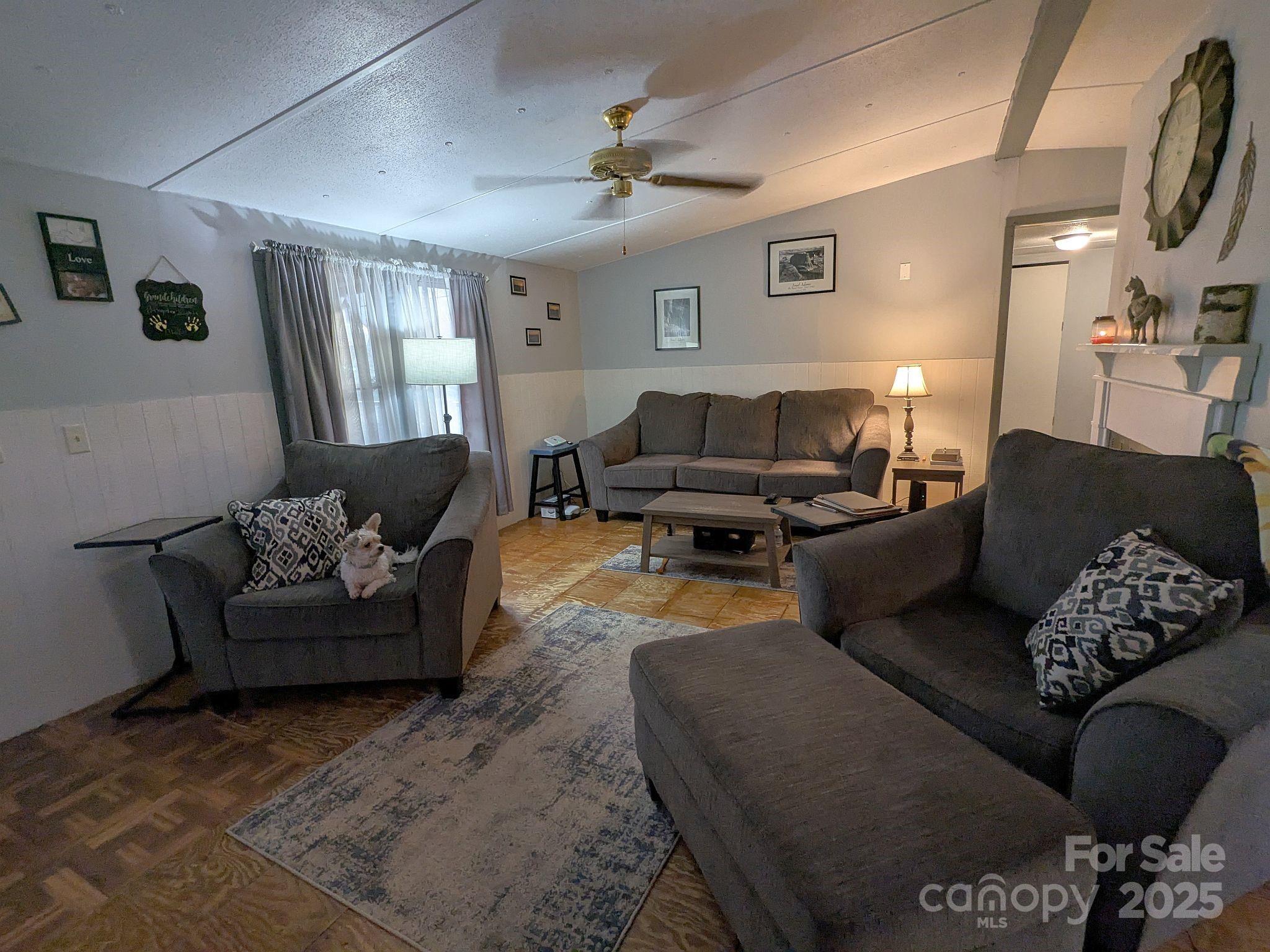 104 Little River Road Fort Mill, SC 29707 - Photo 5 of 21 a living room with furniture and a couch