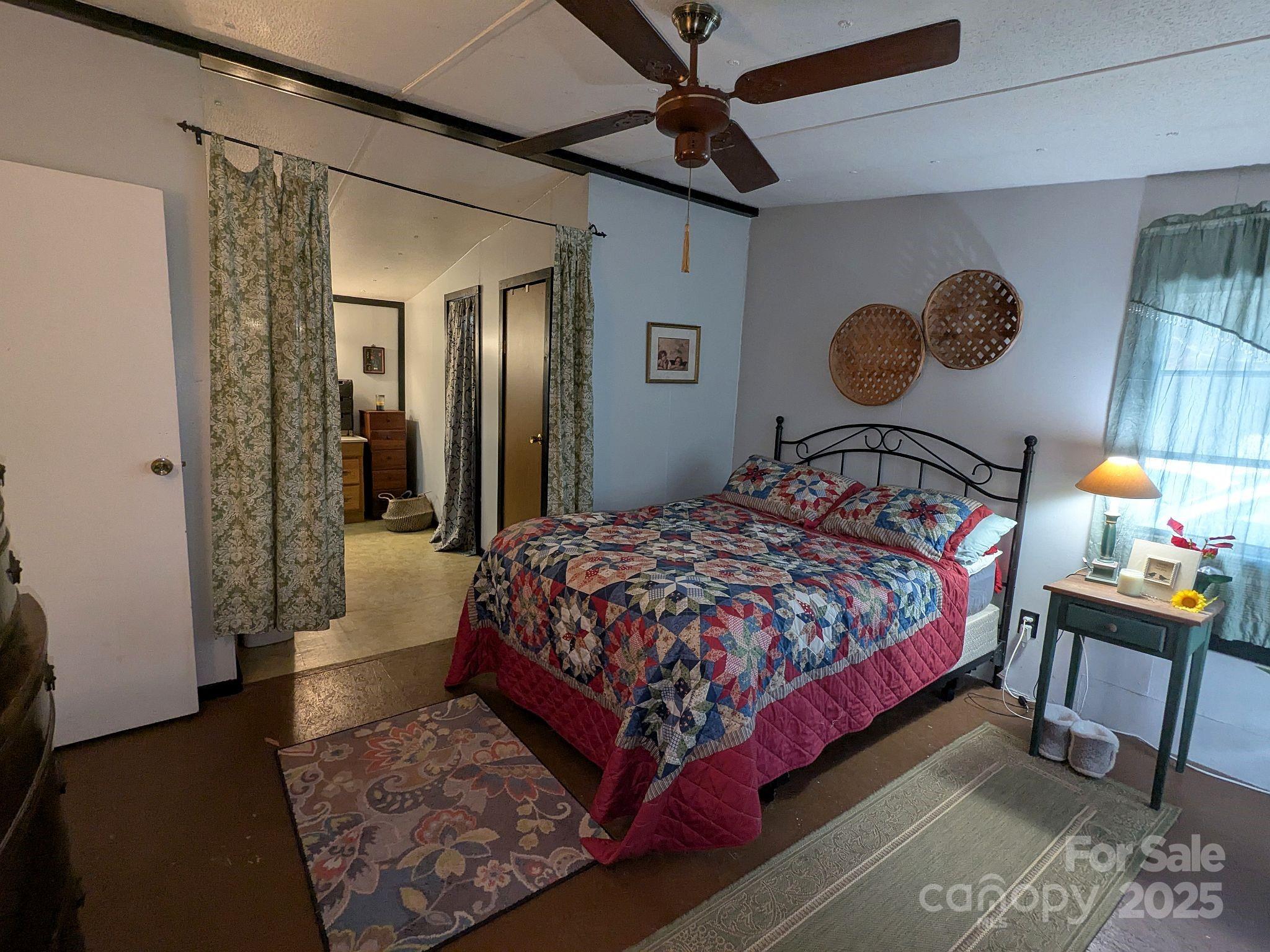 104 Little River Road Fort Mill, SC 29707 - Photo 10 of 21 a bedroom with a bed a window and dresser