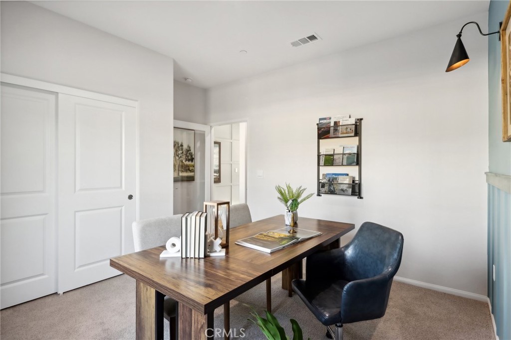 49459 Meadowlark Place Indio, CA 92201 - Photo 17 of 33 a view of a workspace with furniture