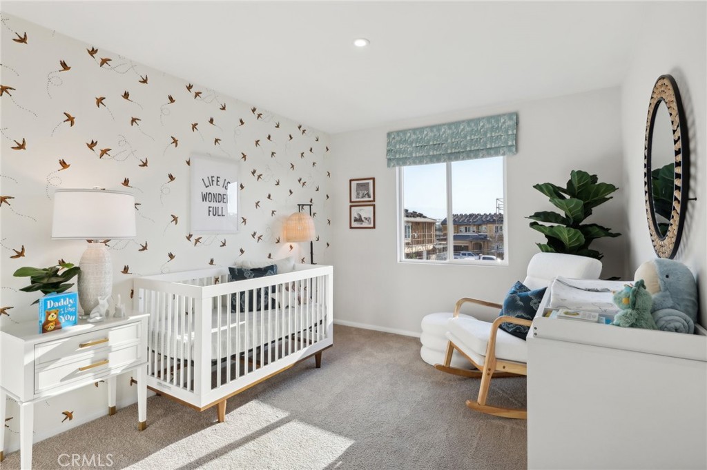 49459 Meadowlark Place Indio, CA 92201 - Photo 22 of 33 a bedroom with furniture and a window