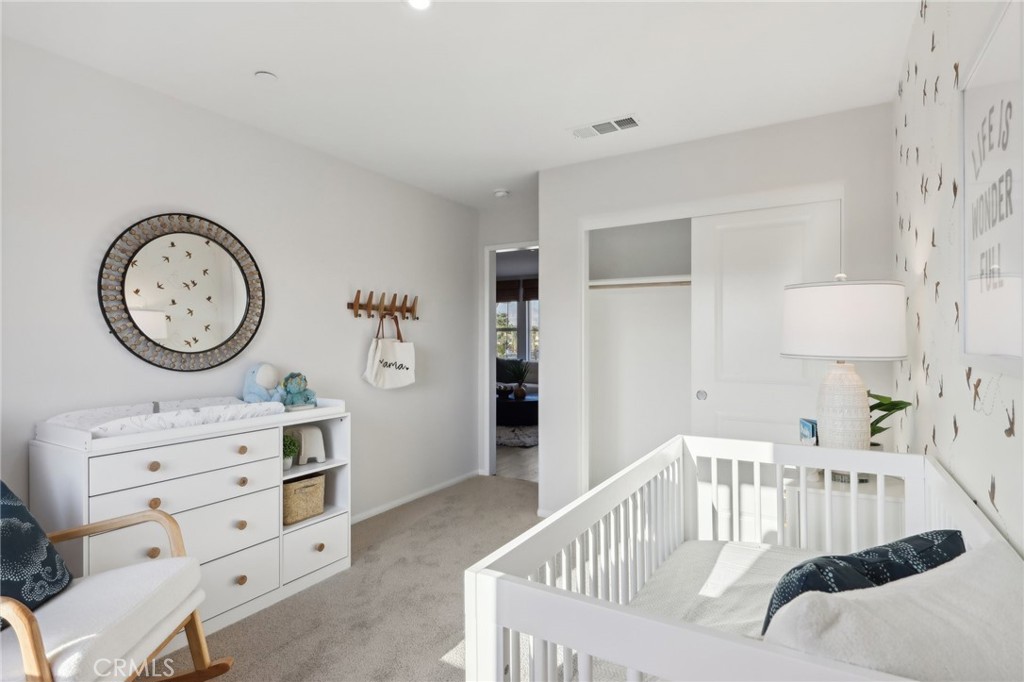 49459 Meadowlark Place Indio, CA 92201 - Photo 23 of 33 a living room with furniture and a table